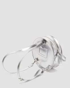 Dr. Martens Last Chance Styles|Last Chance Styles*Metallic Round Backpack in Silver Metallic Silver Metallic — Patent Lamper